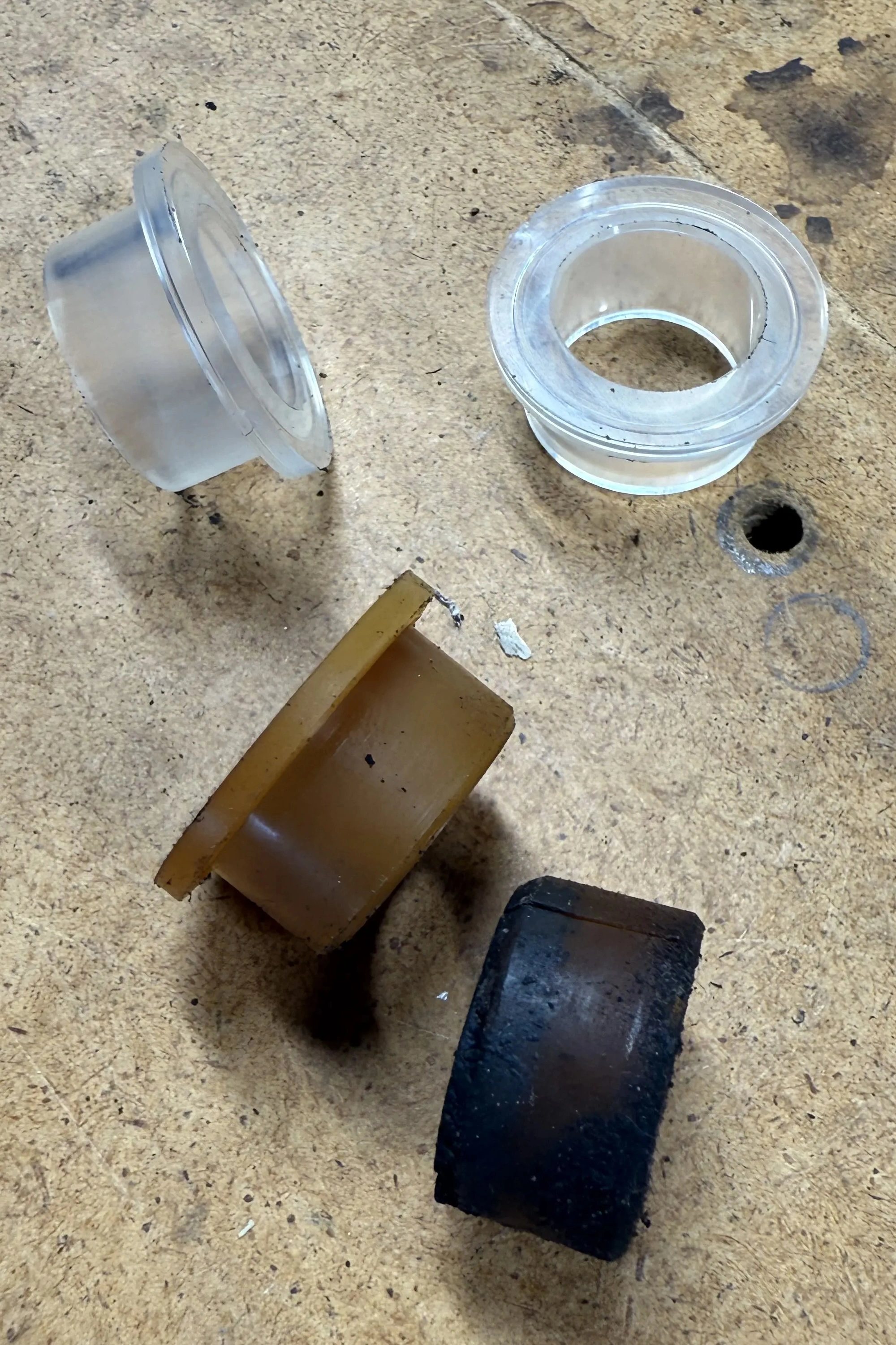 You can see the two new bushings verus the old set.